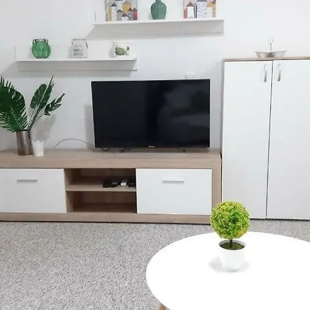 Tomi